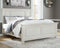 Ashley Robbinsdale Sleigh Headboard & Panel Footboard Queen Bed in Antique White-Washburn's Home Furnishings