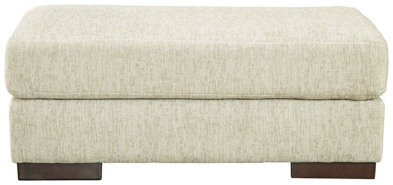 Ashley Caretti Ottoman in Parchment-Washburn's Home Furnishings