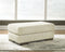 Ashley Caretti Ottoman in Parchment-Washburn's Home Furnishings