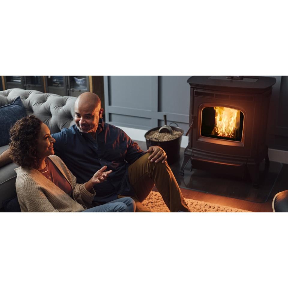 Harman Absolute63 pellet stove in a furnished room; finishes and project materials may be optional