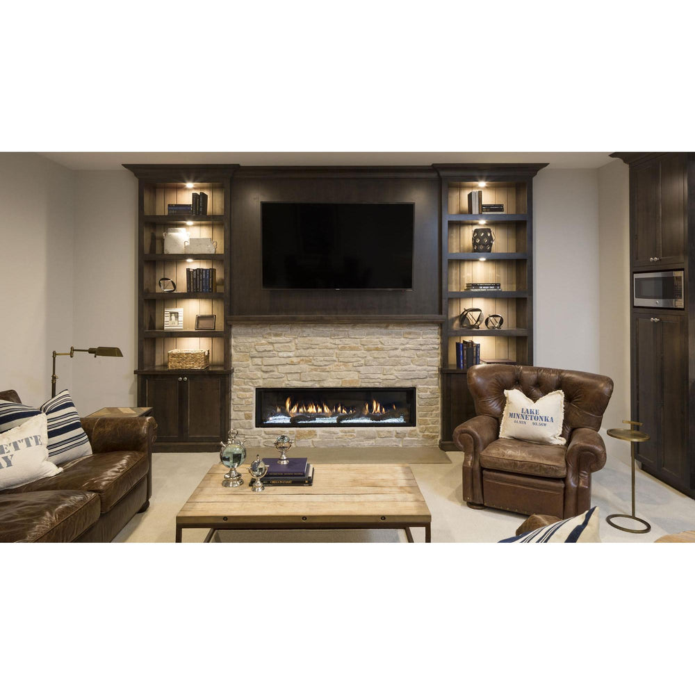 Heat & Glo Mezzo linear modern indoor gas fireplace with ribbon flame and crystal glass media on brick wall in living room. — official Mezzo Linear Indoor Gas Fireplace series image; may show a different size and separately selected options