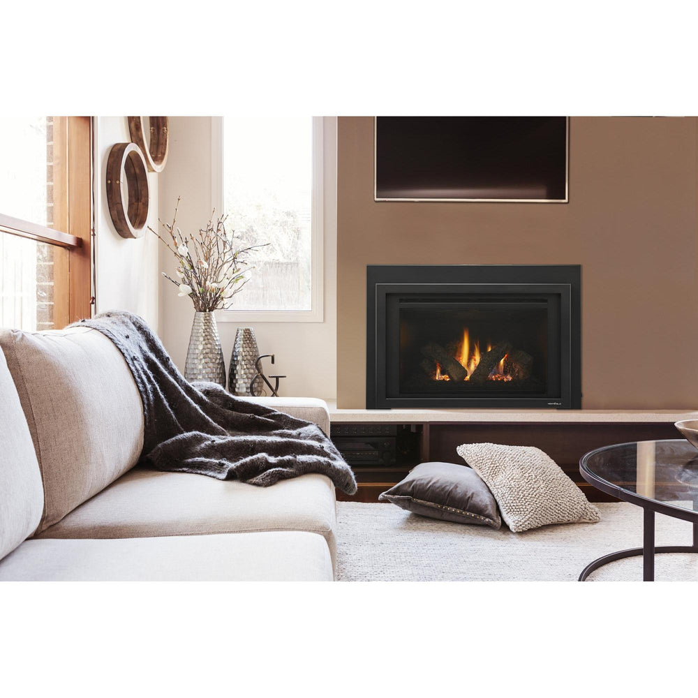 Transitional living room with gas fireplace insert in tan wall, couch with draped throw and pillows on floor.. Official series image; size, front and optional finishes may differ from the quoted configuration.