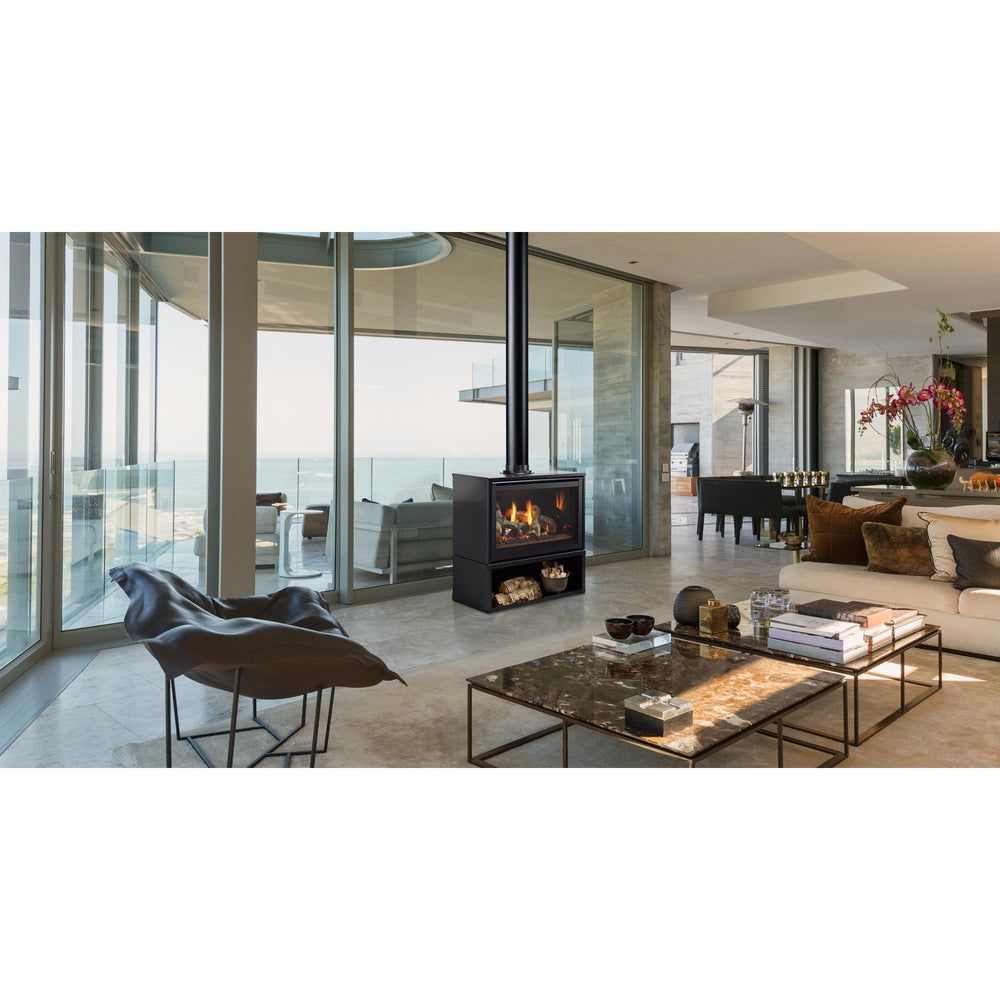 A freestanding gas fireplace is the hub of a large open coastal living room with floor-to-ceiling windows. . Official series image; size, front and optional finishes may differ from the quoted configuration.