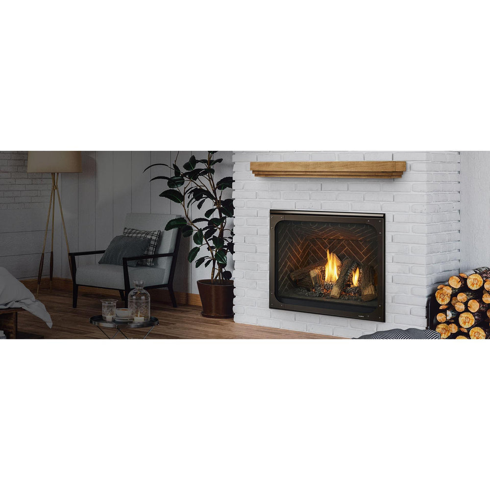 Traditional gas fireplace with logs, live flames, glowing embers and brick interior is flush to the floor in white mantel. — official Caliber Gas Fireplace series image; may show a different size and separately selected options
