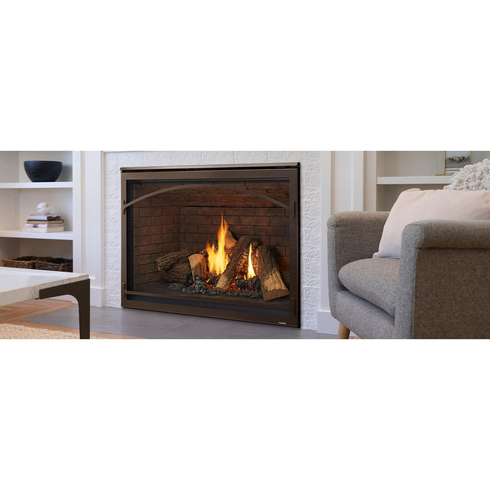 Traditional gas fireplace with logs, live flames, glowing embers and brick interior is flush to the floor in white mantel. — official Caliber Gas Fireplace series image; may show a different size and separately selected options