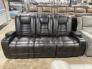 Manwah Reclining Sofa w/2 Cupholders, 2 Arm Rest Storage Consoles & Drop Down Table in Brown Vinyl-Washburn's Home Furnishings