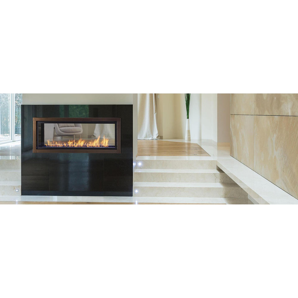 Artisan-48-in-See-Through-vent-free-gas-fireplace-in-floor-to-ceiling-column-in-center-of-modern-living-space. Manufacturer series illustration; shown size, accessories and room finishing may differ from the quoted configuration.