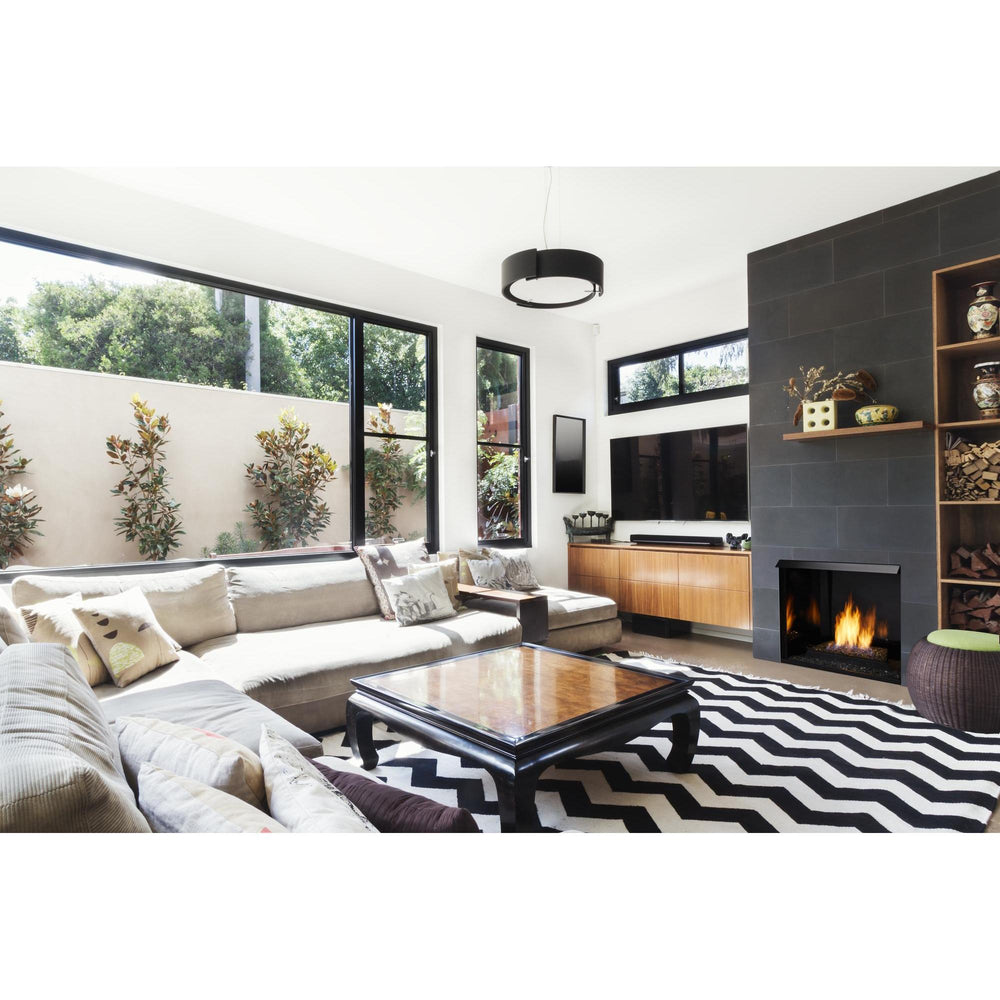 Monessen Lyric 18 Contemporary Gas Burner — Lyric in Lo-Rider in room Black glass interior Onyx fire glass; enclosure and optional accessories may be separate