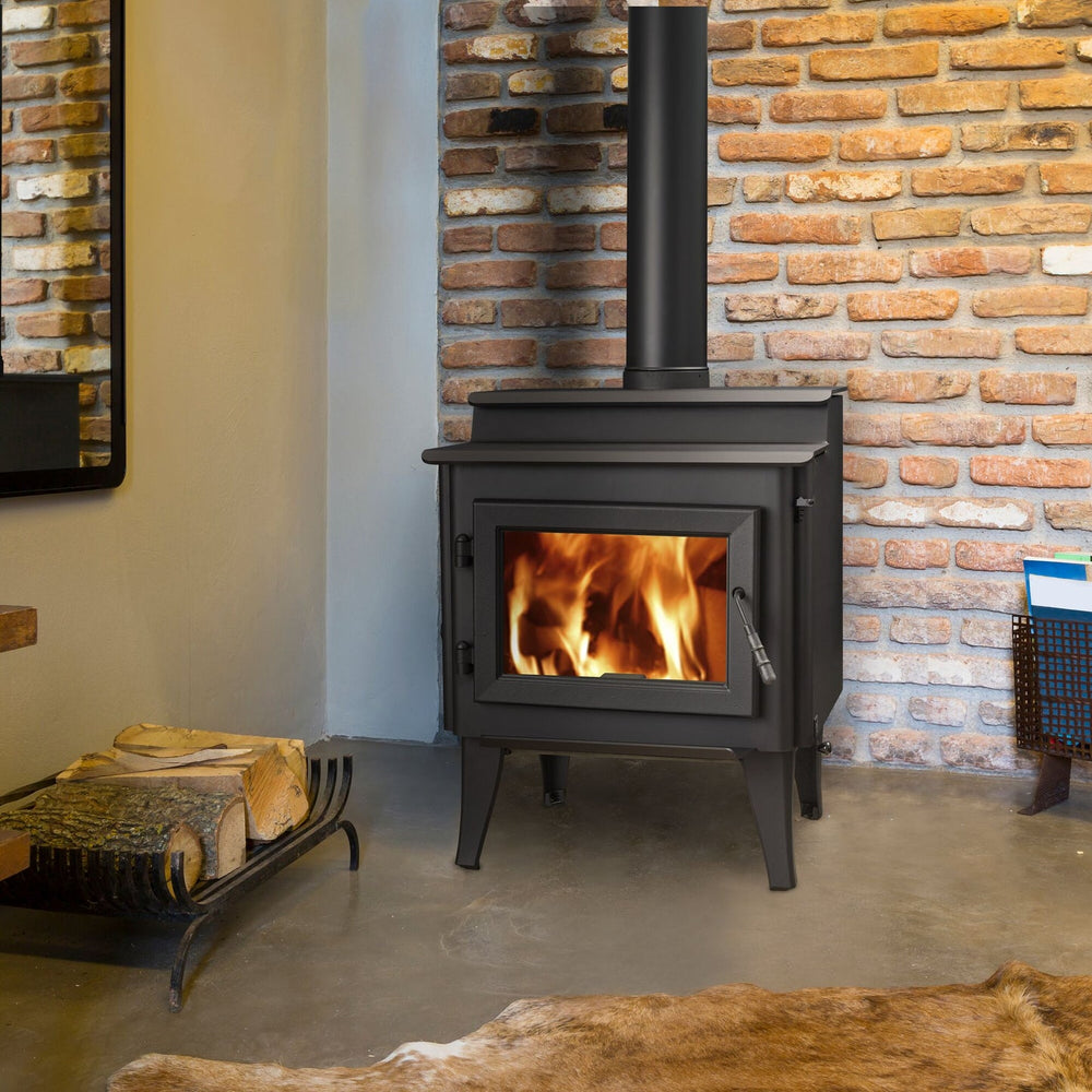 Quadra-Fire 4300 Step Top wood stove in room installation; chimney and finish materials separate
