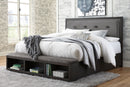 Hyndell - Dark Brown - California King Upholstered Panel Bed With Storage-Washburn's Home Furnishings