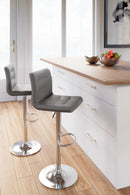 Pollzen - Gray - Tall Uph Swivel Barstool(2/cn)-Washburn's Home Furnishings